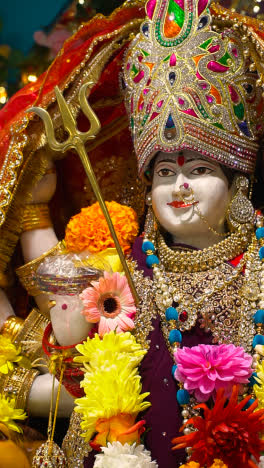 Vertical-Video-Close-Up-Of-Statue-Of-Hindu-Goddess-Durga-Mata-Ji-At-Celebration-Of-Navratri